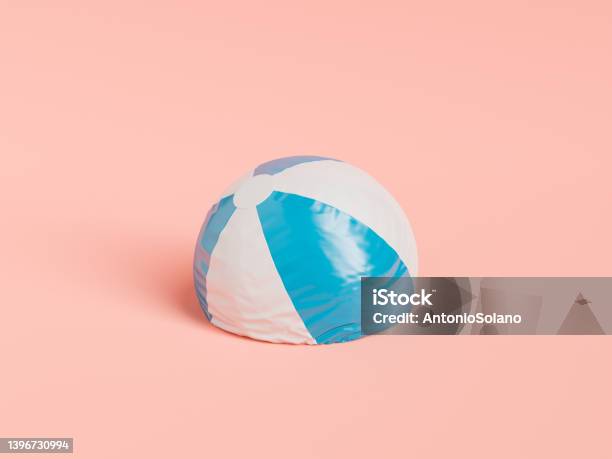 Deflated Beach Ball With Stripes Stock Photo - Download Image Now - Failure, Deflated, Sports Ball