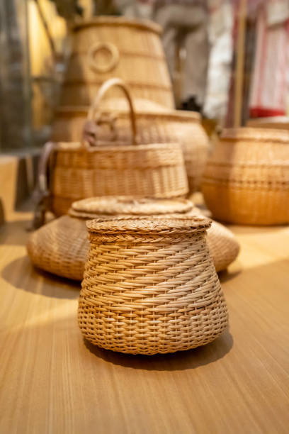 istock Big Round wicker rattan baskets with lids for interior design a lot in store. Different types. Front view 1396732226