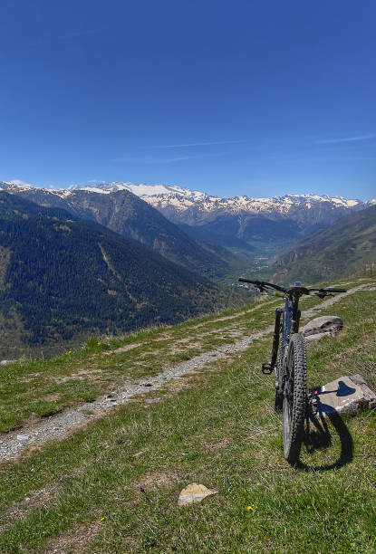 istock Nice mountain trail with the spring snow behind. 1396732336
