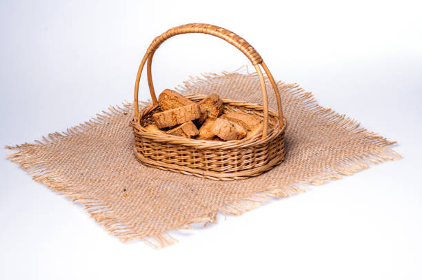 crispy rusk or toast in a basket on the table, closeup