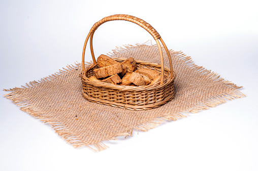 crispy rusk or toast in a basket on the table, close - up