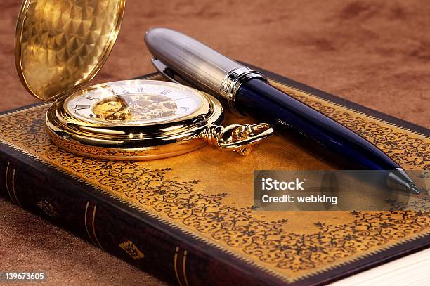 Book And Watch Stock Photo - Download Image Now - Pocket Watch, Ballpoint Pen, Book