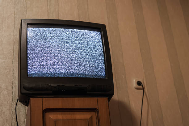 istock Retro old tube television with static glitch displayed on screen 1396737606