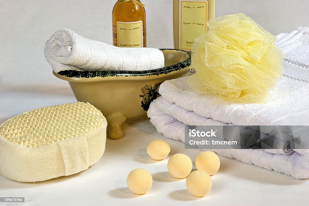 Bath Accessories 4 Various bath accessories including a body sponge, loofa, towel, lotion, oil, etc. Aromatherapy Oil Stock Photo