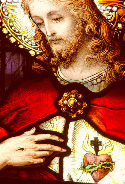 sacred heart - stained glass glass art church stock-fotos und bilder