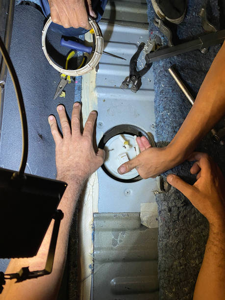 istock Automobile mechanical maintenance and fuel tank float repair. 1396740605