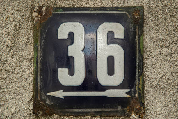 istock Weathered enamelled plate number 36 1396741571