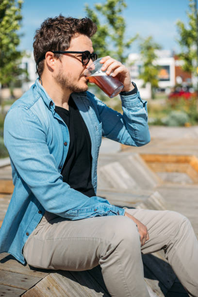 istock Man having beer in outdoor 1396741931