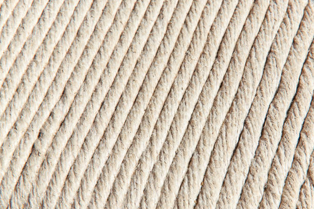 White rope in rows as a coating on the floor stock photo