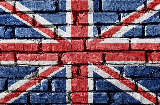 Flag of the Great Britain on a brick wall. Union Jack texture