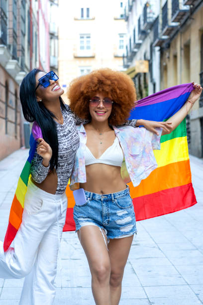 istock couple enjoying gay pride party 1396748044