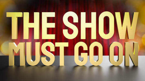 istock show must go on gold text on stage for entertainment or present concept 3d rendering 1396749728