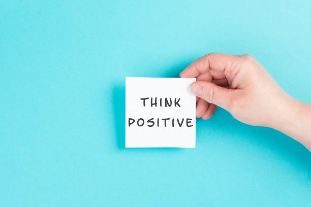 istock The words think positive are standing on a paper, optimistic mindset, coaching and motivation concept, attitude for success 1396751044