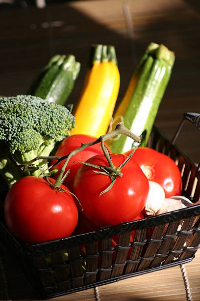 vegetables: broccoli ,  zucchini and tomatoes stock photo