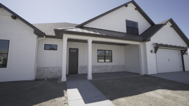 New Construction House White Exterior Black Trim Modern Push In Towards Front Of House