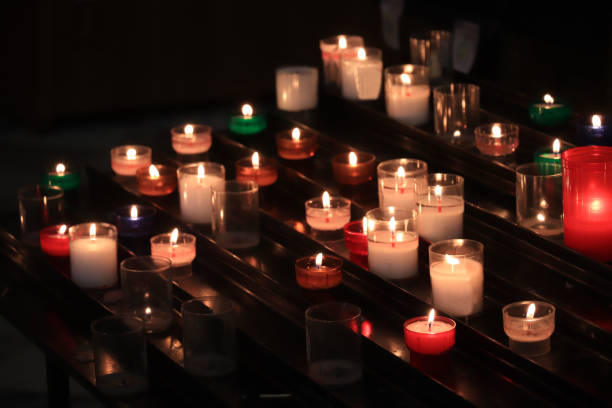 istock Votive candles in a church 1396754065