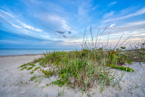 istock Vibrant Sunset with a Dramatic Sky at Cocoa Beach in Central Florida USA 1396757213