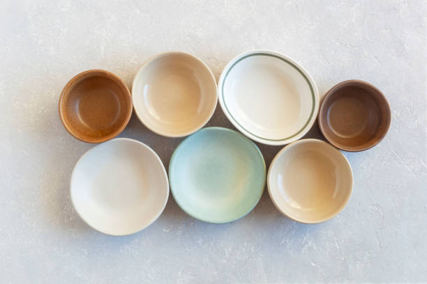 istock Collection of many empty soft color bowls, top view 1396757394