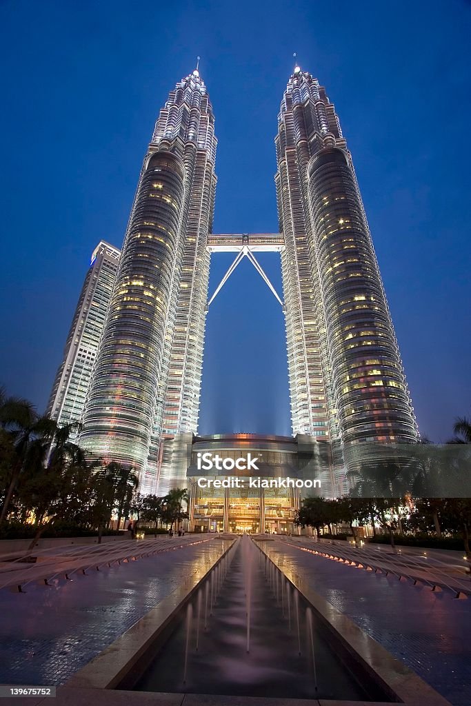 Lit up Petronas Twin Towers at night Petronas Twin Towers night scene Architecture Stock Photo