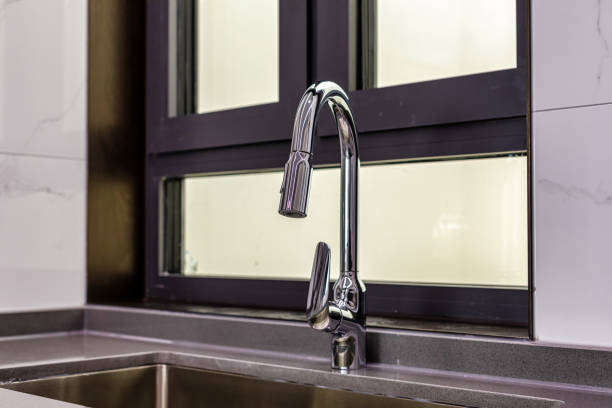 istock kitchen stainless steel faucet 1396760506