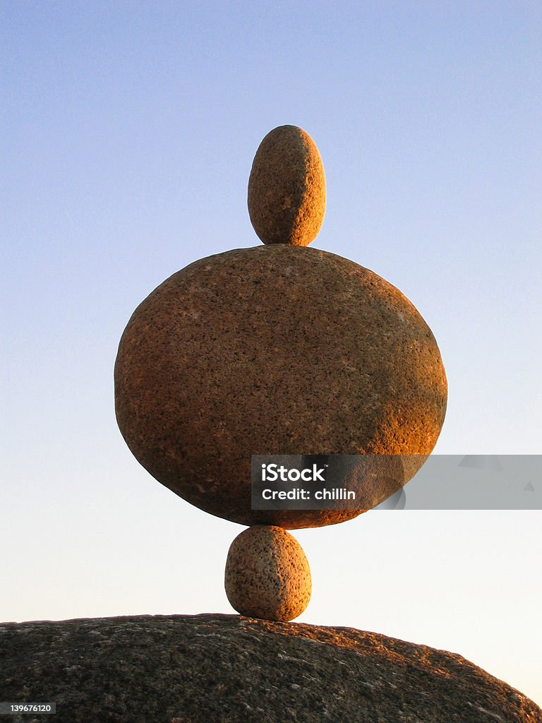 Three stones balancing Three circular stones balancing Balance Stock Photo