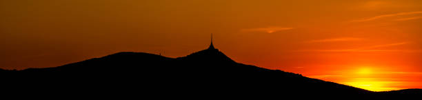 istock Silhouette of Jested mountain at sunset time, Liberec, Czech Republic. Panoramic shot 1396761300