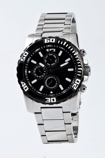 Luxury wristwatch with black elegant background