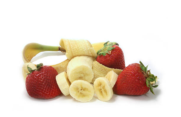 istock Strawberries and Bananas Over White 139676281