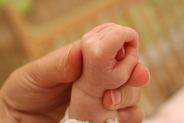 istock Mother's and baby's hand 139676284