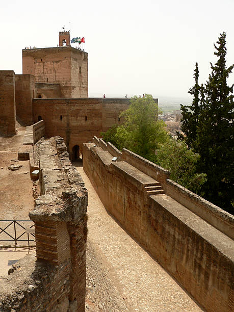 On September 14th 2024 in Granada, Spain – Panoramic view of the historic Alhambra palace and fortress complex, a UNESCO World Heritage site and one of the most important examples of Islamic architecture in Europe. Set atop a lush hillside, the Alhambra is a renowned cultural and historical landmark in southern Spain. Editorial use only.