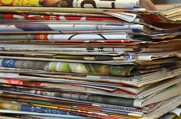 istock Stack of old newspapers and magazines for recycling 139676910