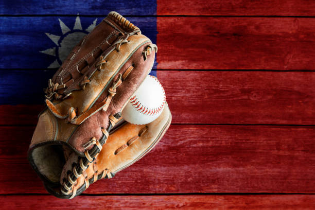 istock Leather Baseball Glove With Ball on Painted Taiwanese Flag 1396769192
