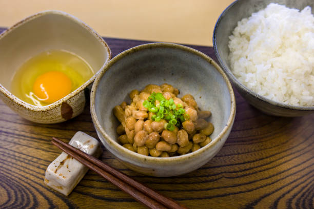 Natto rice Natto is a fermented soybean food and is often eaten as a health food in Japan. Mix, add soy sauce, place on rice and eat. bacillus subtilis stock pictures, royalty-free photos & images