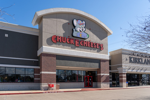 Pearland, Texas, USA - March 1, 2022: A Chuck E. Cheese restaurant in Pearland, Texas, USA. Chuck E. Cheese is an American family entertainment center and restaurant pizza chain.