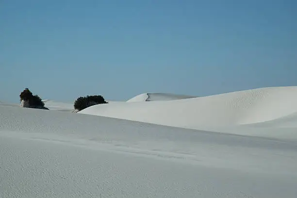 Gypsum sand Dunes in White Sands National Park, New Mexico. It lies in the Tularosa Basin at the northern end of the Chihuahuan Desert. Just 40 miles south of Trinity Site