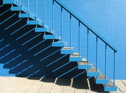 blue stairway on out side of building