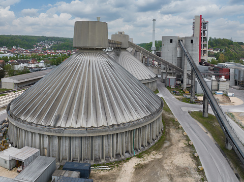 Concrete and Cement Factory Plant Industrial Silos, Aerial Drone Point of View. Germany, Europe.