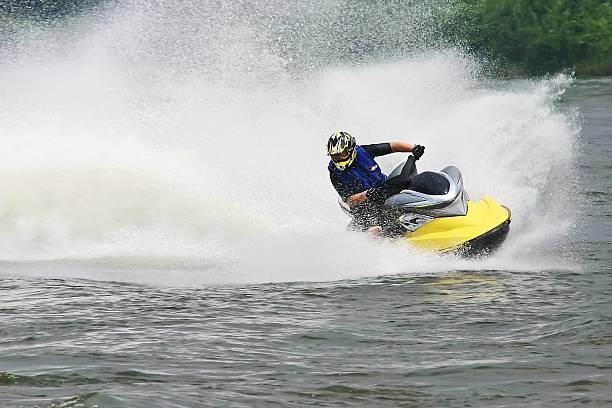 11 year old kneeboarding on the water