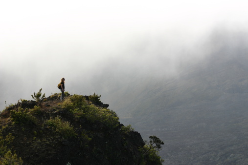 Elevation 10,000 feet. Stopped to rest and look out into the crater as the mist rolled over the ridge.