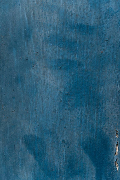 istock Blue wood texture with imperfections and bumps. Close up 1396787687