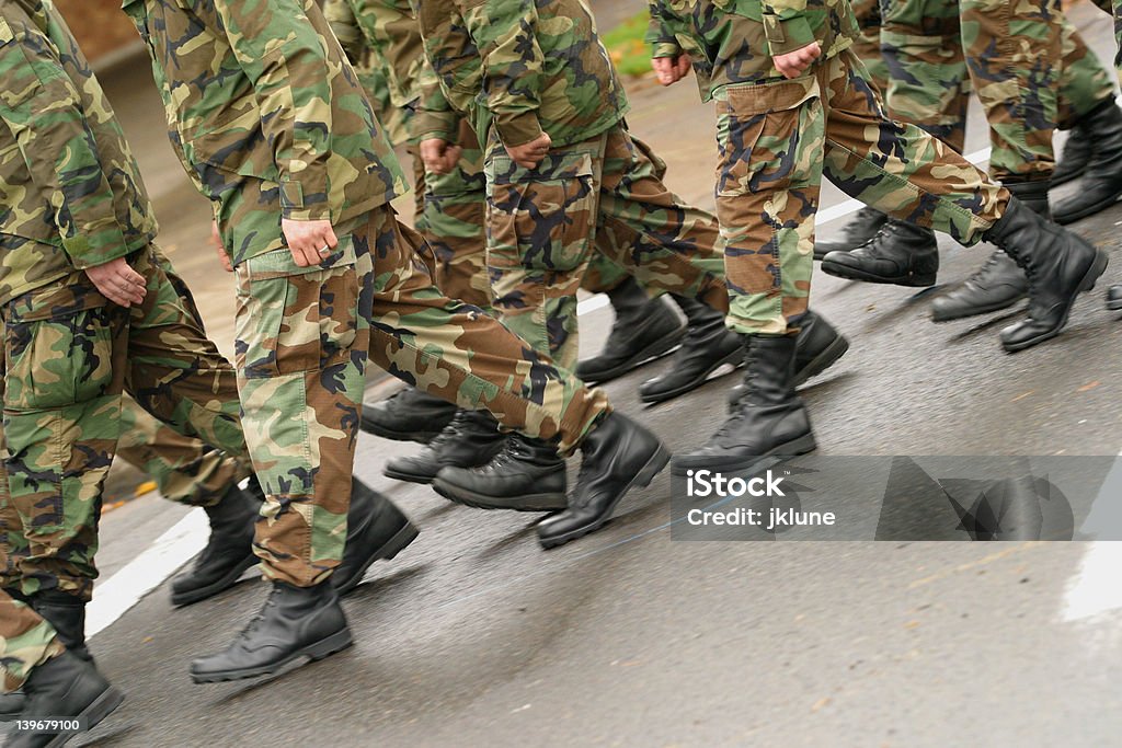 Marching Soldiers marching in a parade. Armed Forces Stock Photo