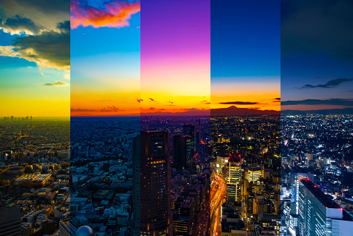 A sliced time lapse photography of panoramic cityscape in Tokyo day to night. Shibuya district Tokyo / Japan - 12.03.2019