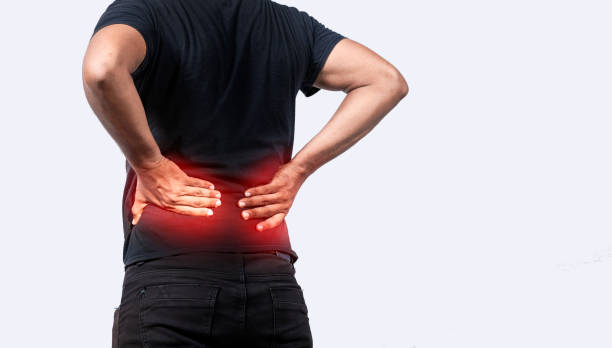 istock A sore man with back pain, Man with spine problems, person with back problems on isolated background, lumbar problems concept 1396793952
