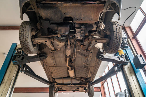 istock car on jack during repair in service 1396797205