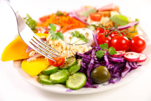 plate of mixed vegetable salad and fork