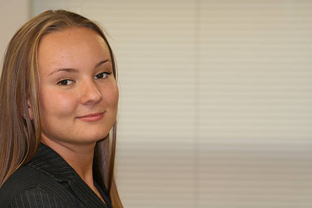istock young woman in the office 139680482