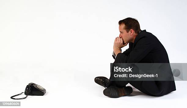 Man Watching The Phone Waiting On An Expected Call Stock Photo - Download Image Now