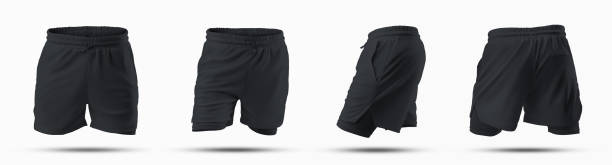 istock Mockup of black loose shorts with underpants compression line, 3D rendering, isolated on background, front, back, side view. 1396806591