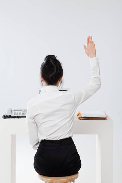 istock back view of woman in suit 1396809055