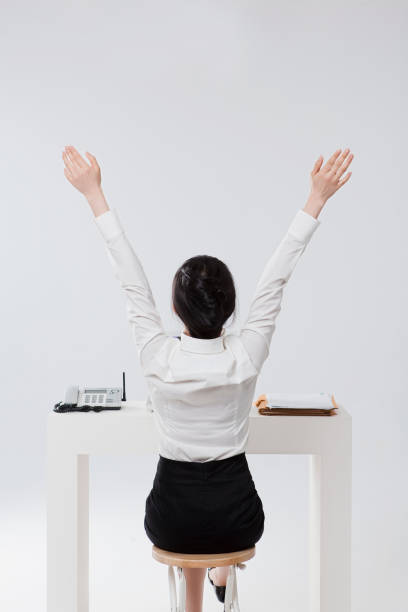 istock back view of woman in suit 1396809059